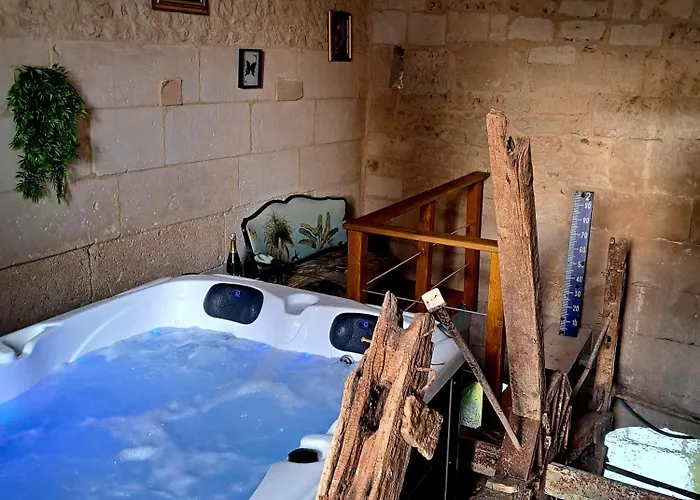 صورة Gite Insolite Dans Un Moulin A Eau Avec Spa Privatif Champagnac 